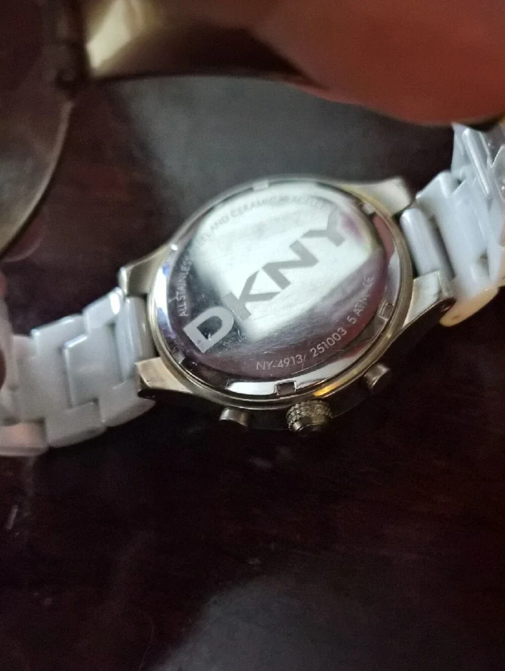 DKNY White Ceramic Chronograph Watch with Gold Accents